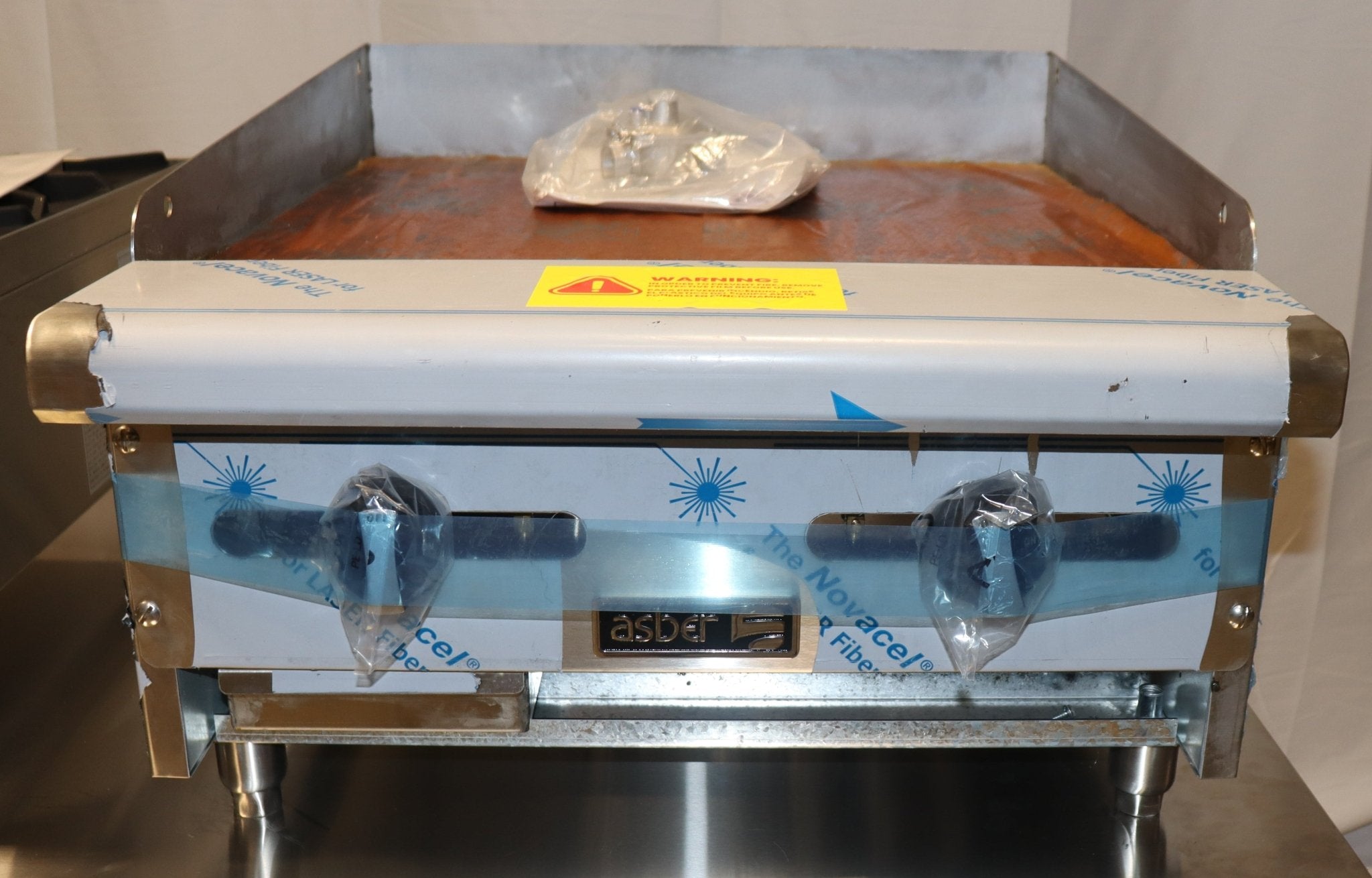 Asber AEMG 24 H 24" W Stainless Steel Natural Gas Manual Countertop Griddle, 60k BTU - NMB Restaurant Equipment
