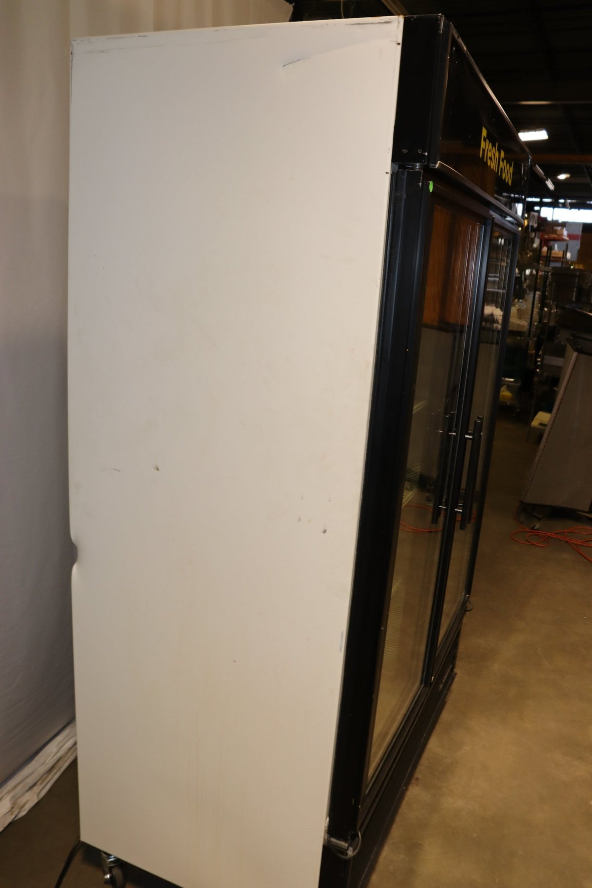 True Refrigeration GDM-49 Glass Door Merchandiser, w/ Shelves & Casters - NMB Restaurant Equipment