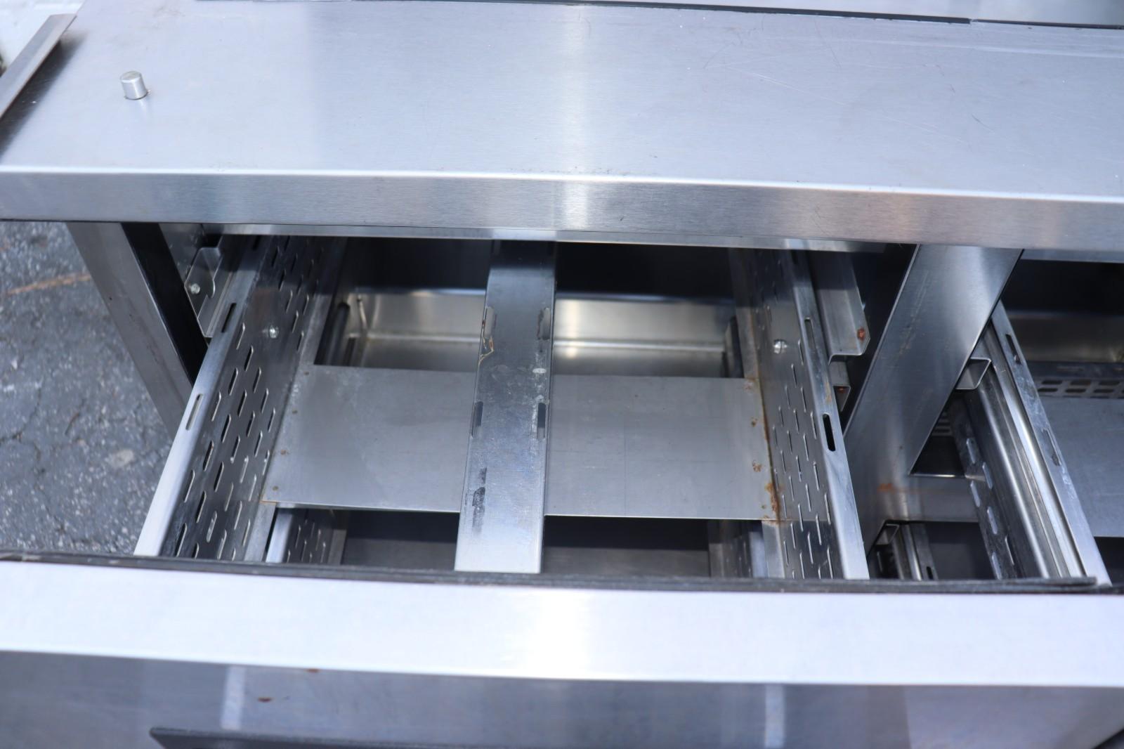 True TFP-48-18M-D-4 48" Mega Top Food Prep Table w/ 18 Pan Cap., 4 Drawers, Used