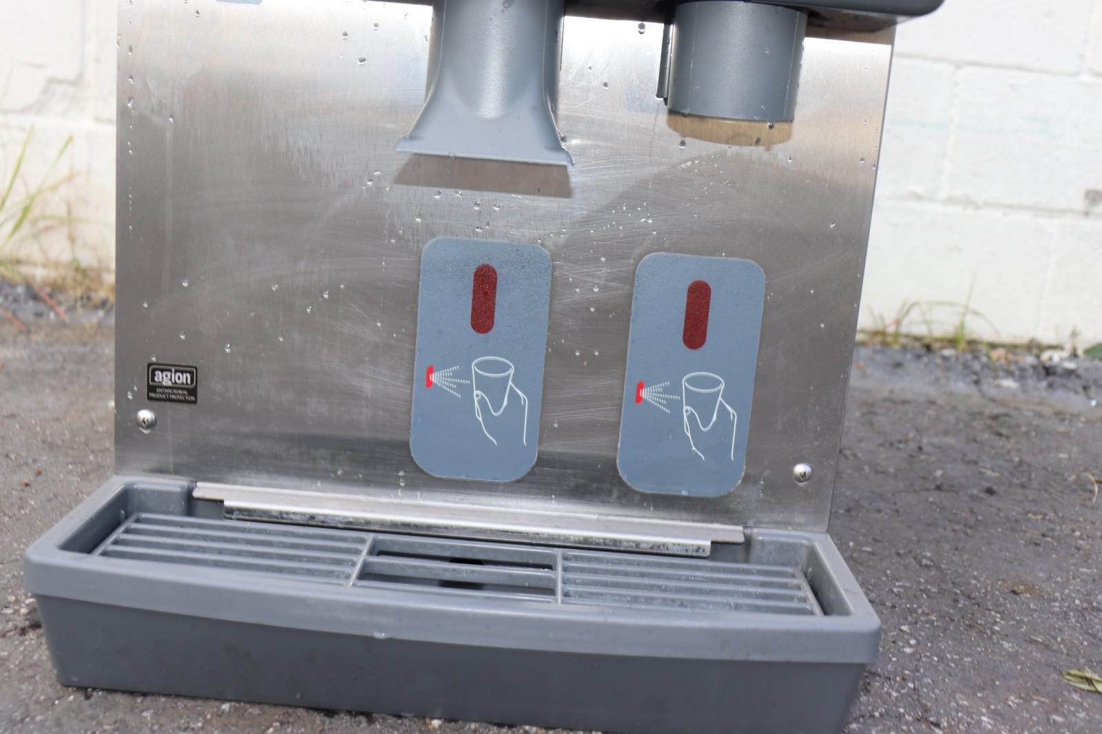 FOLLETT SYMPHONY PLUS 12CI425A ICE MAKER AND WATER DISPENSER, USED CLEAN