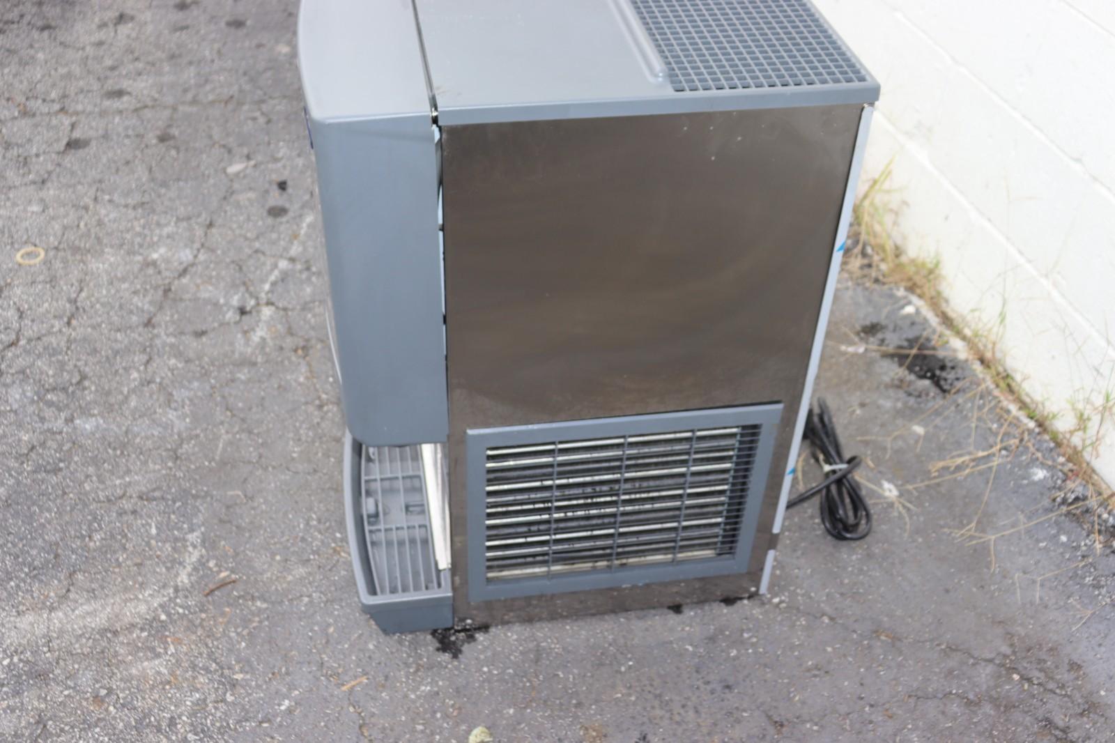 FOLLETT SYMPHONY PLUS 12CI425A ICE MAKER AND WATER DISPENSER, USED CLEAN