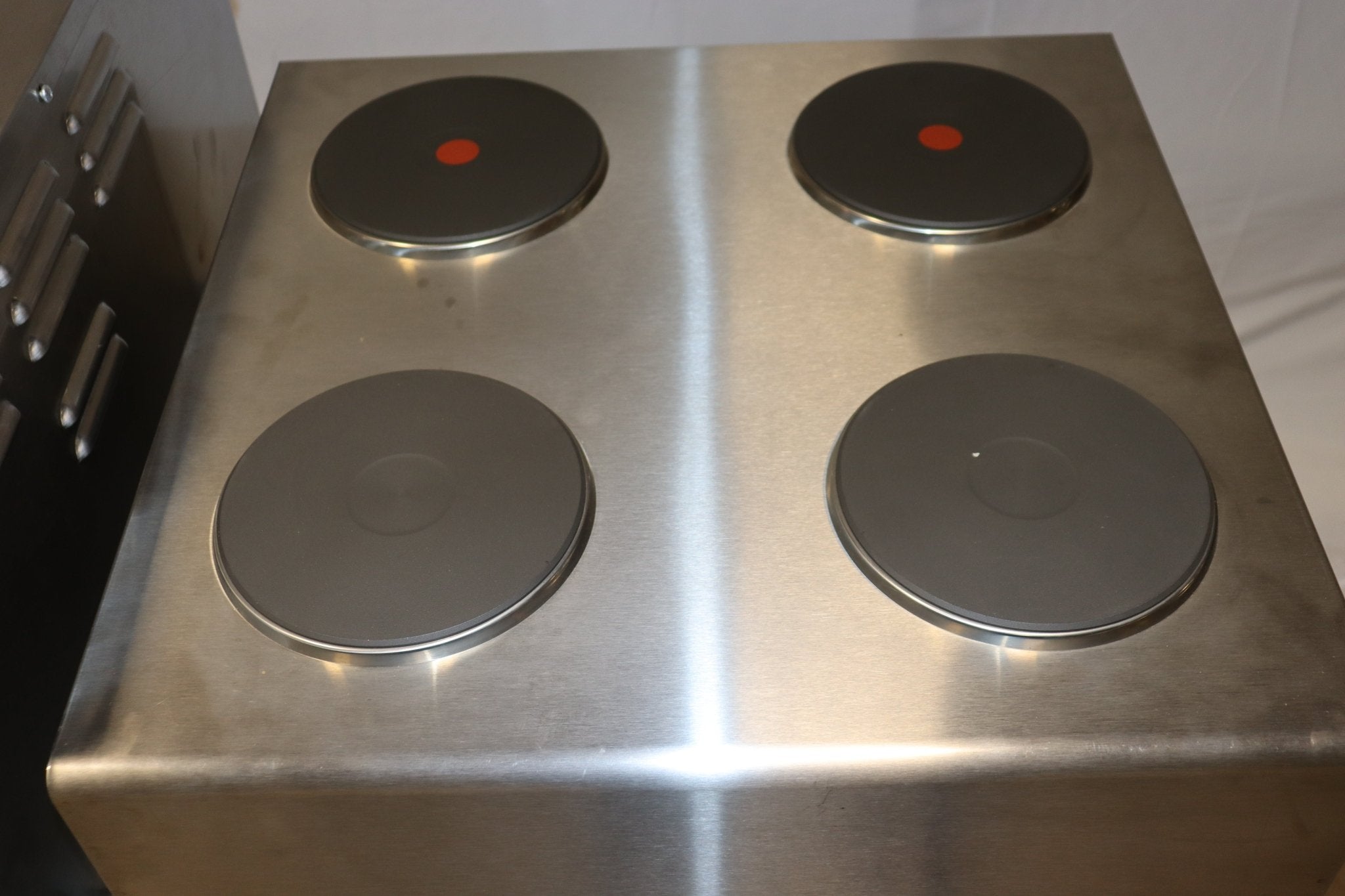 Nemco 6311-4-240 Electric Countertop Raised Hot Plate with 4 Solid Burners 240V - NMB Restaurant Equipment